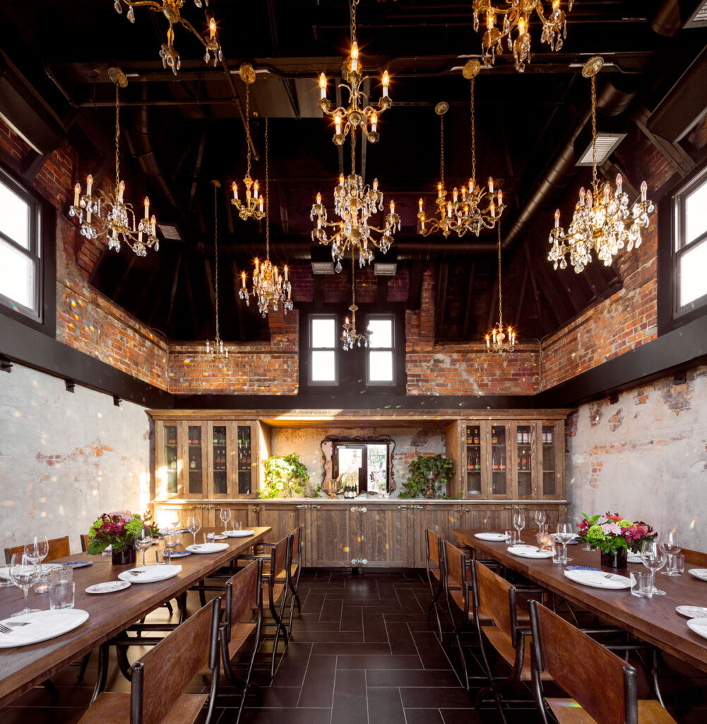 Interior dining room with decorative chandeliers.