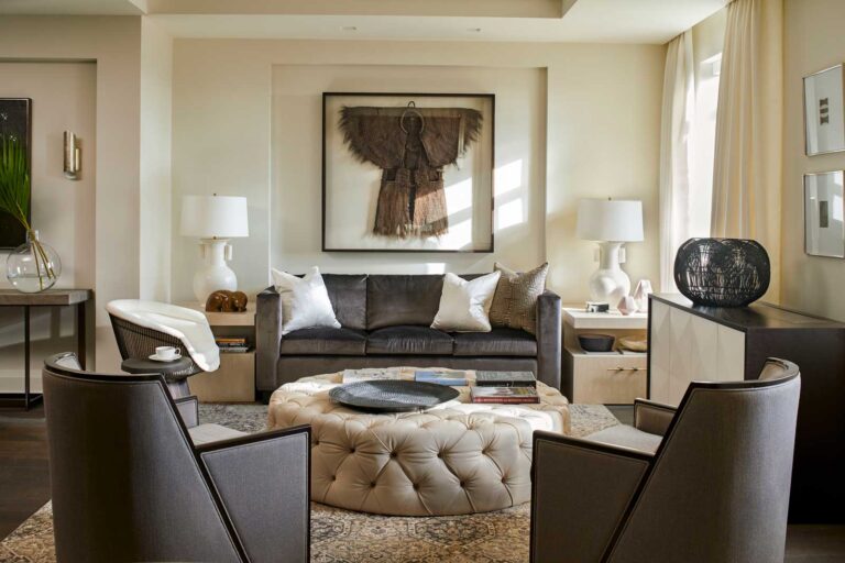 Luxe living room area in creams, browns and with cozy textured elements.