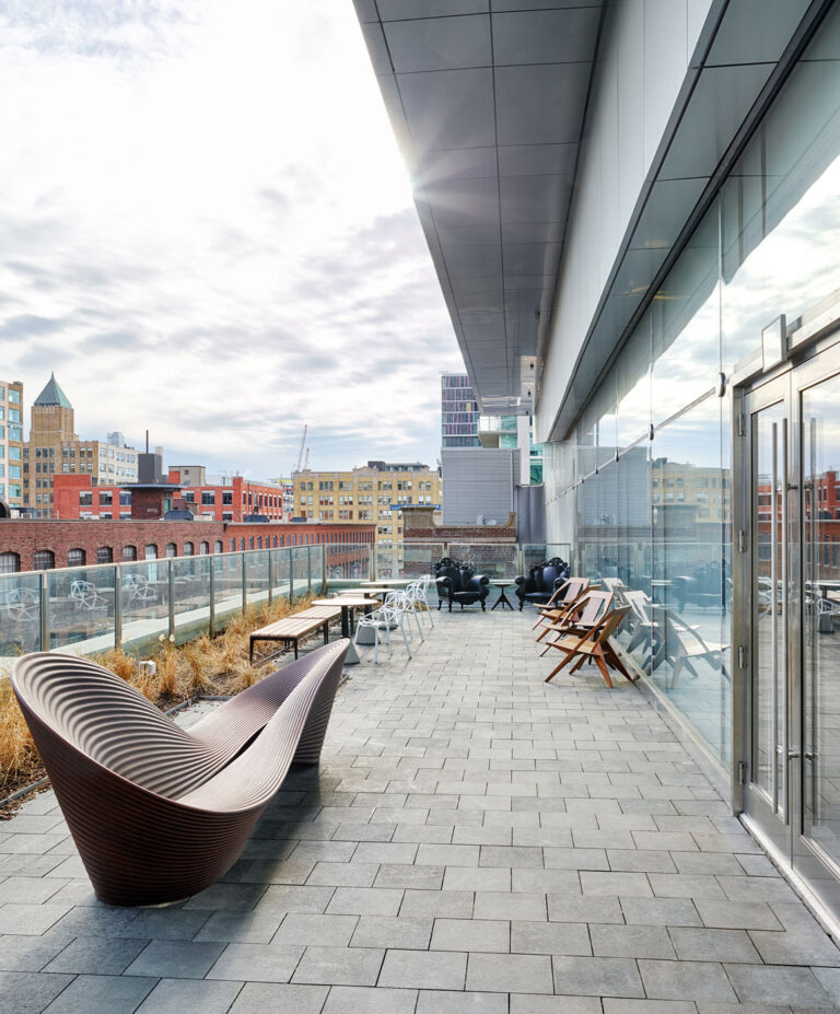 Office balcony view with seating options and a great view of downtown Toronto.