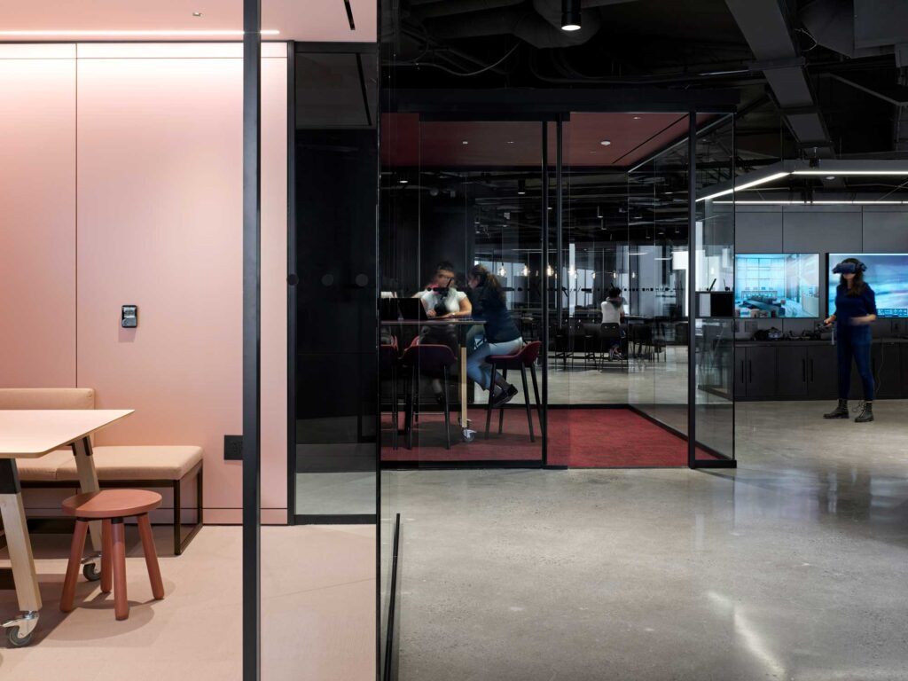 A pink phone room provides a plush place to have a quick meeting in Smart City Sanbox.