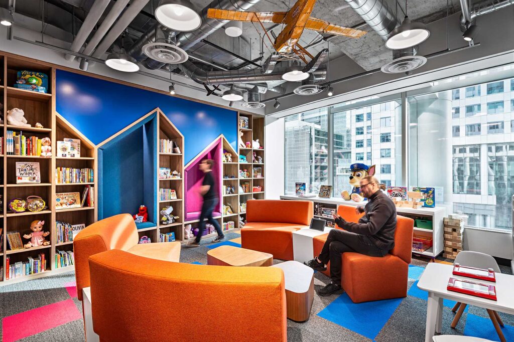 A space for ideas and brainstorming at Spin Master with seating, books, toys and games for staff.