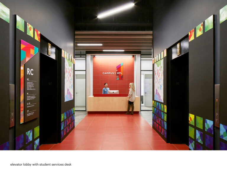 The elevator bank at Campus 1 Mtl is painted in sleek black but energised with colourful tiled graphics.