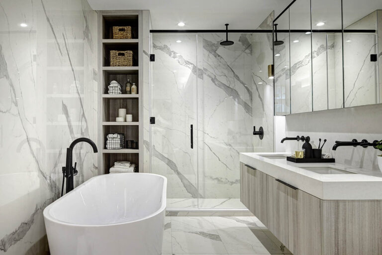 Bathroom vignette-soaker tub and a shower, white and grey marble walls and floors, clean modern lines on the vanity and black hardware throughout