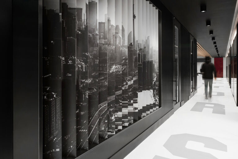 A large image of Toronto is displayed on an entire wall of the hallways leading to the offices.