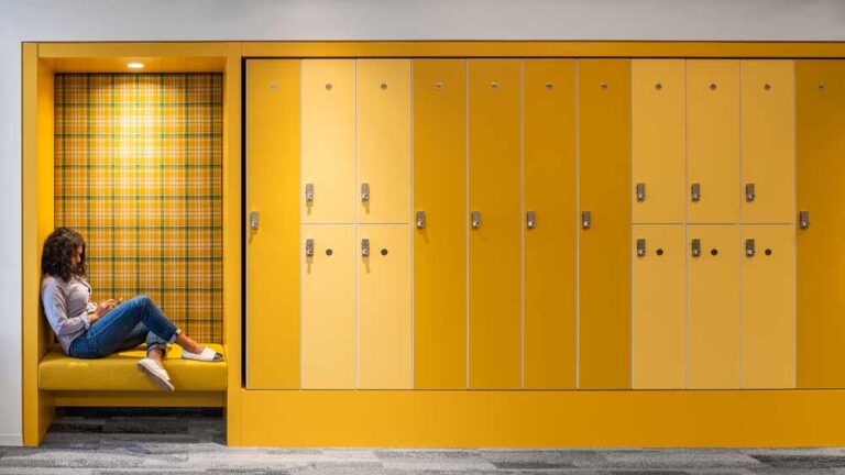 Bright yellow storage lockers and a built in seating alcove