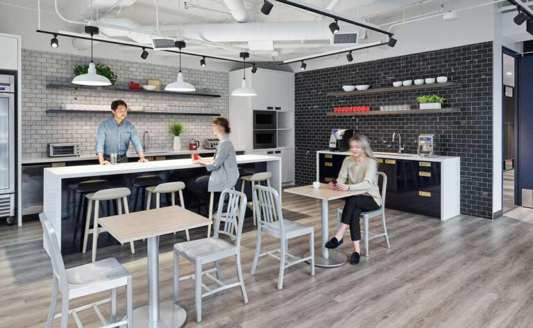 Contemporary and inviting cafe with contrasting finishes in whites, black and dark blues
