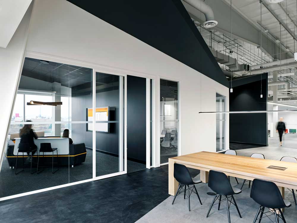 Black and white contrasts throughout the office interior
