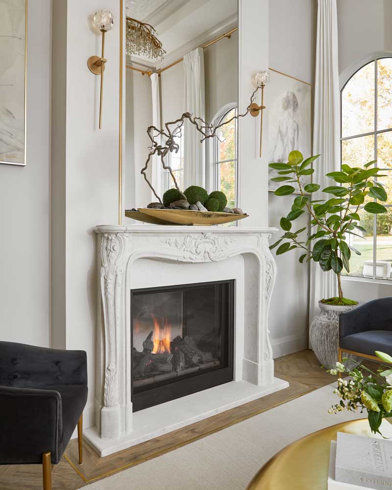 A vignette of the fire place in the lounge room