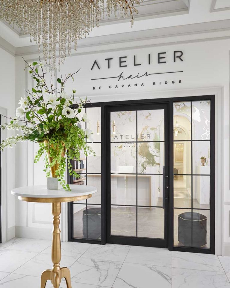 A view from the foyer to the main entrance to Atelier Hair that