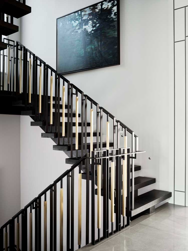 statement staircase with an interesting railing design