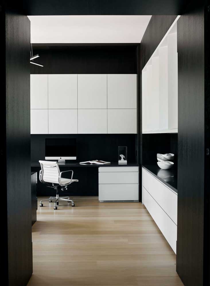 Office desk and cabinetry that tuck everything away with no visible mess from the door