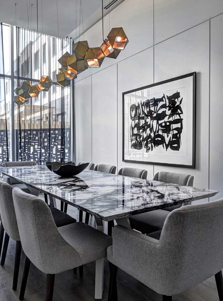 Private dining room on main floor in black and white and geometric chandelier