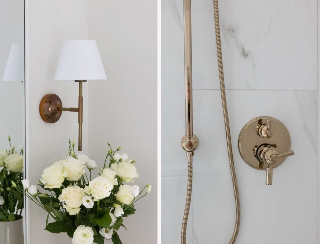 Unlacquered brass finish on the hardware and wall sconces in the bathroom