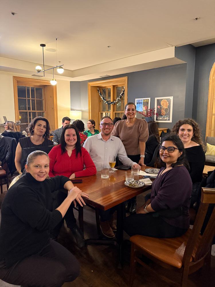 WAC members sitting at the table socializing