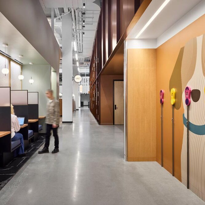 Pooch parking - A hallway with a place to tie dog leashes with a fun dog wall mural and colourful details