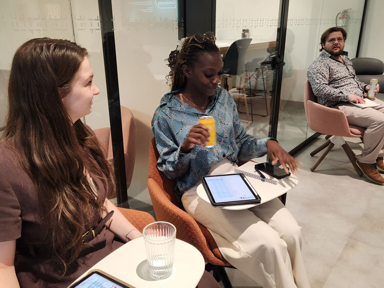 A photo of attendees sitting down