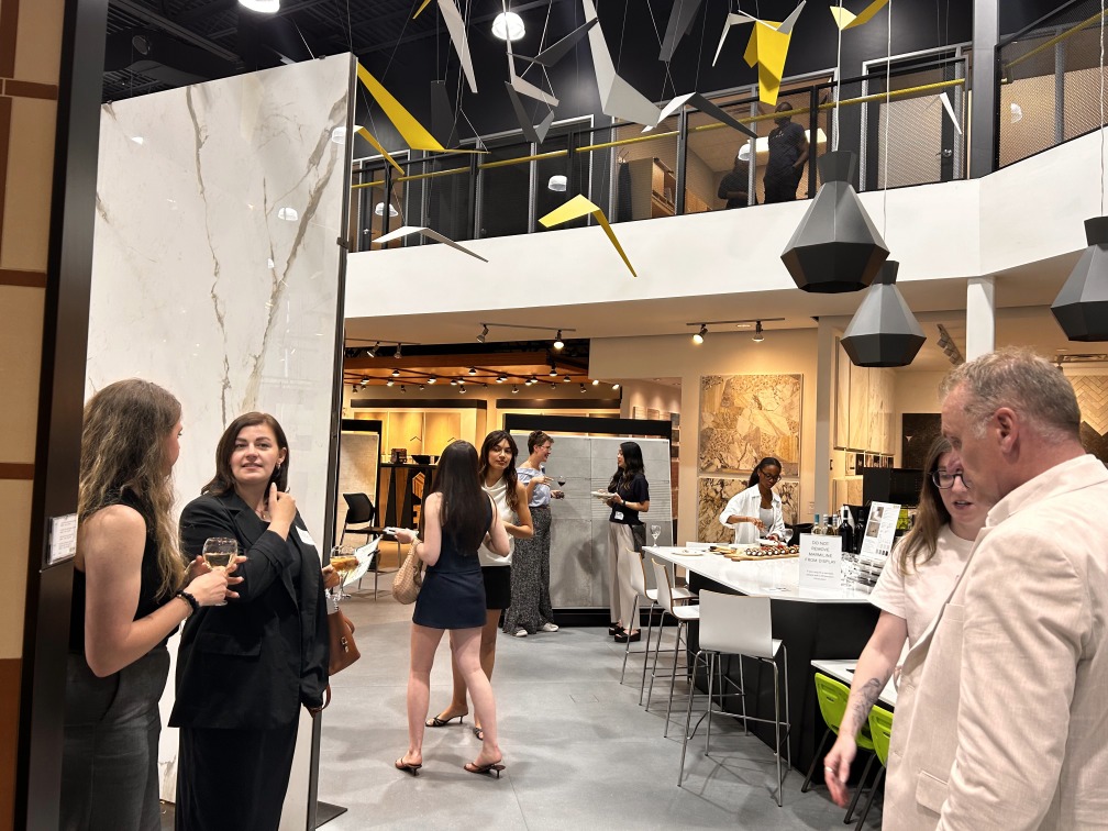 Candid photo showing attendees of the night and the venue - Euro Tile & Stone's showroom in Ottawa. 